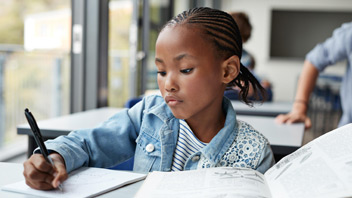 girl-at-school-writing